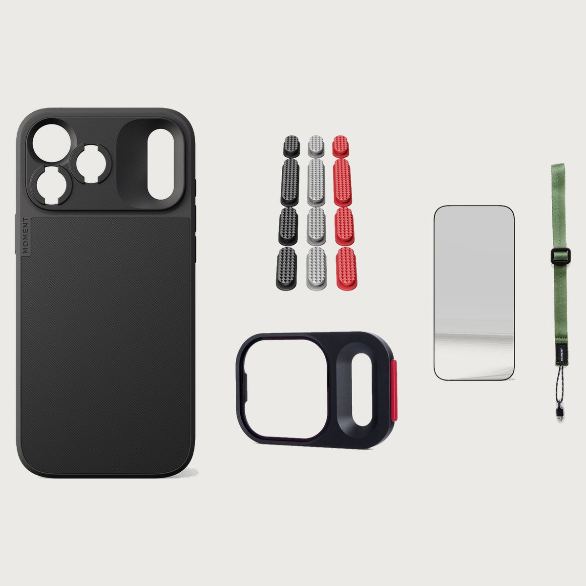 iphone-18-pro-max-case-essentials — Black case, Metal Grip Pack (Black/Silver/Red), Olive wrist strap (AR glass + CineClear UV; no drop-in / no cleaning kit)