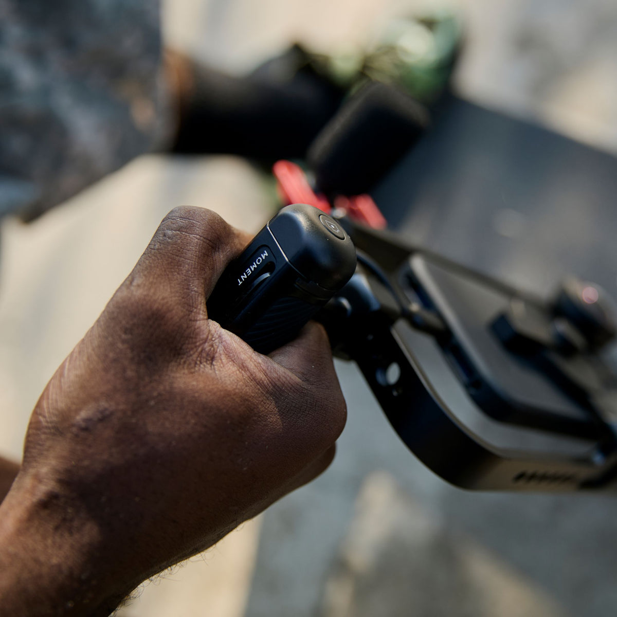 Moment camera case and mobile rig for iPhone 16, showing off the filmmaker cage and universal grip.