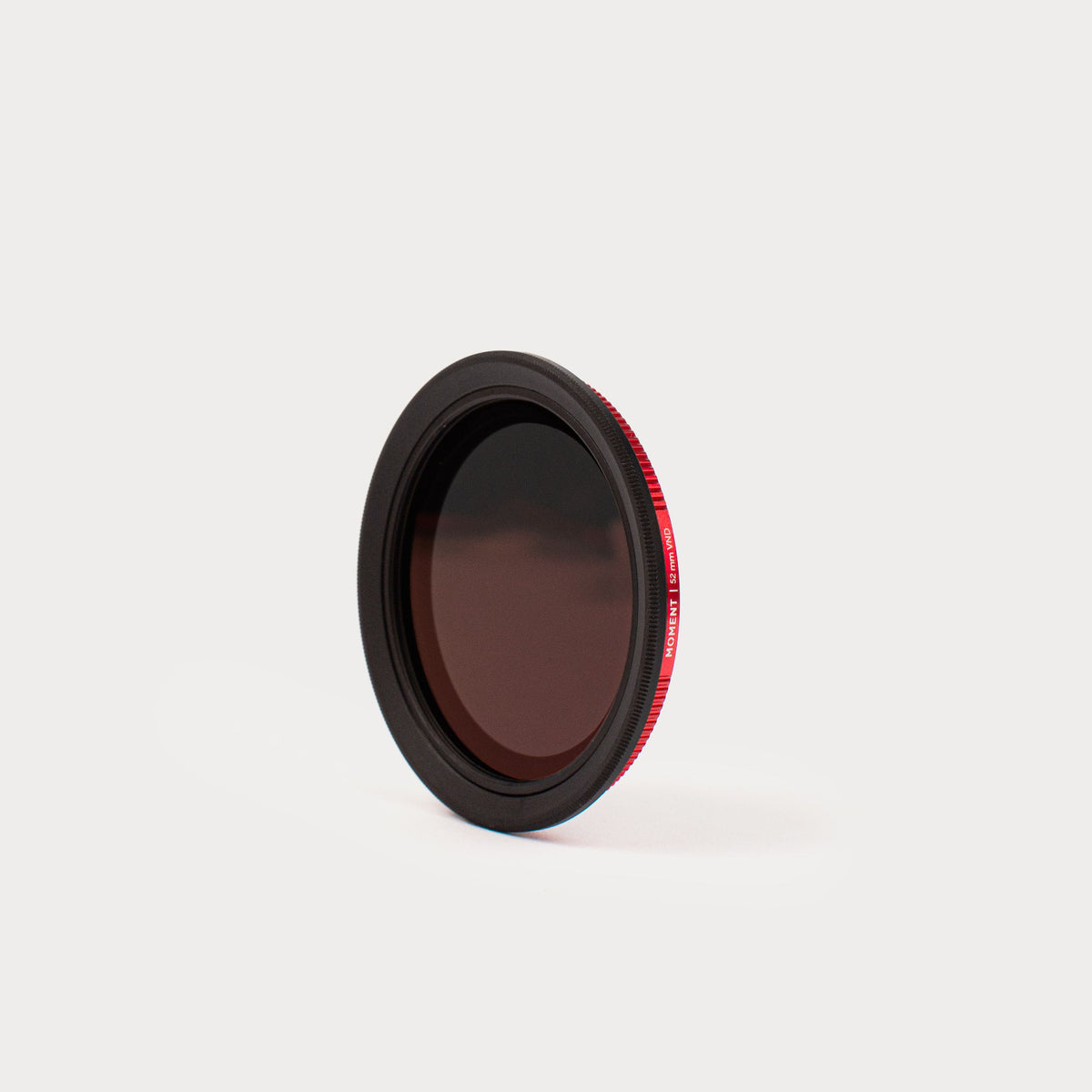 a close up of a red filter on a white background