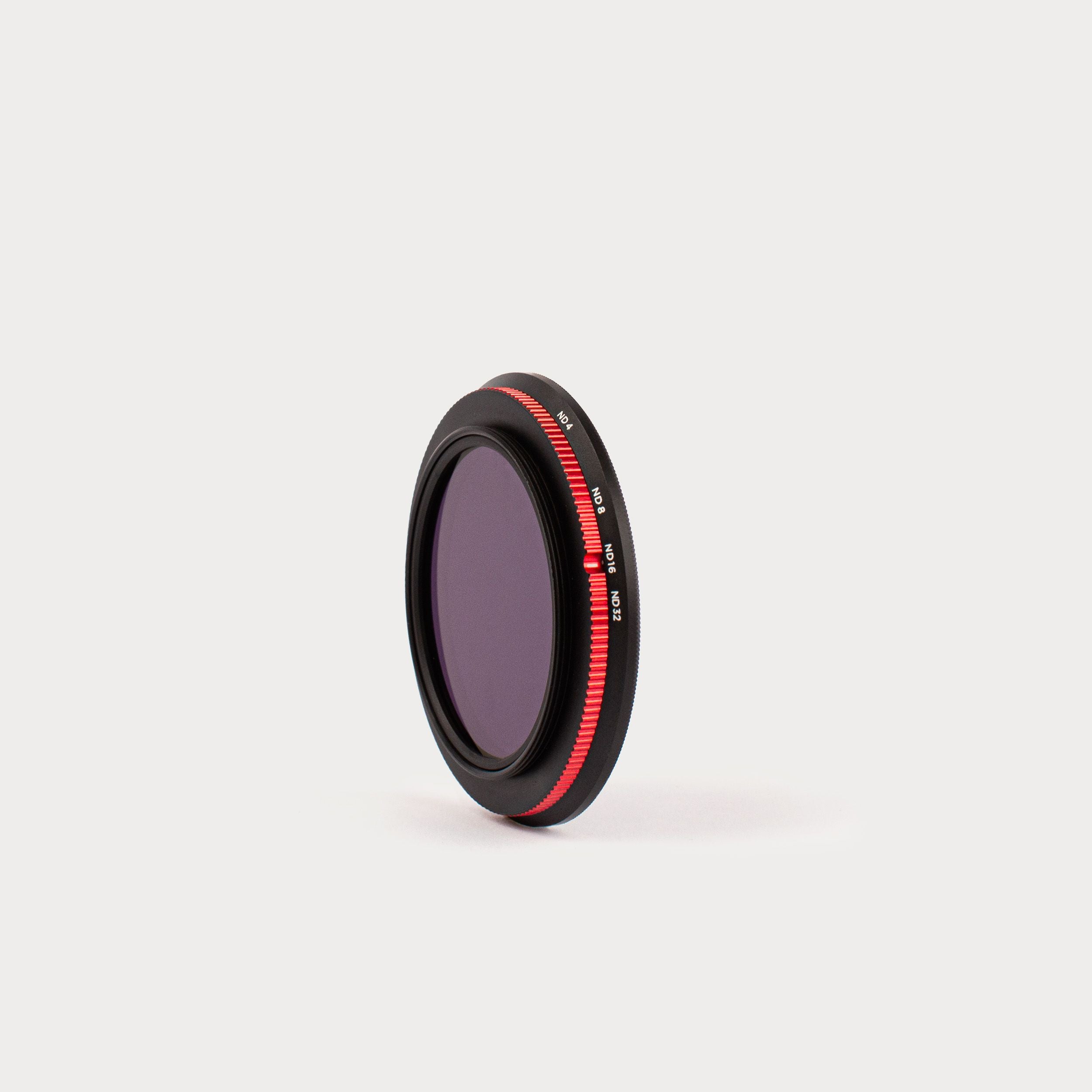 a close up of a camera filter on a white surface .