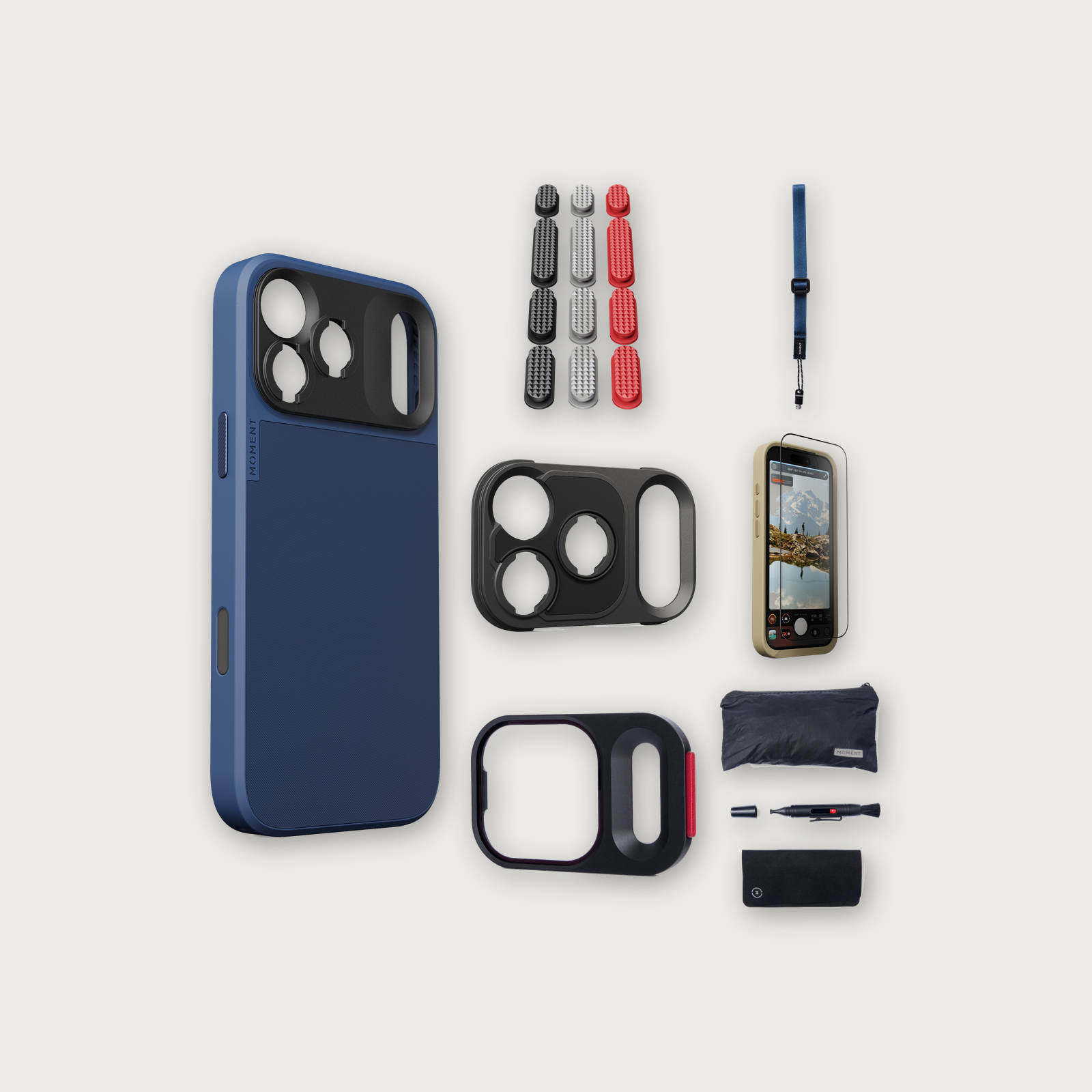 iPhone 17 Pro Max Case Essentials — Indigo case, Metal Grip Pack (Black/Silver/Red), Indigo wrist strap (Drop-in 310-323, AR glass 310-327, CineClear UV 310-347, Cleaning kit 150-102)