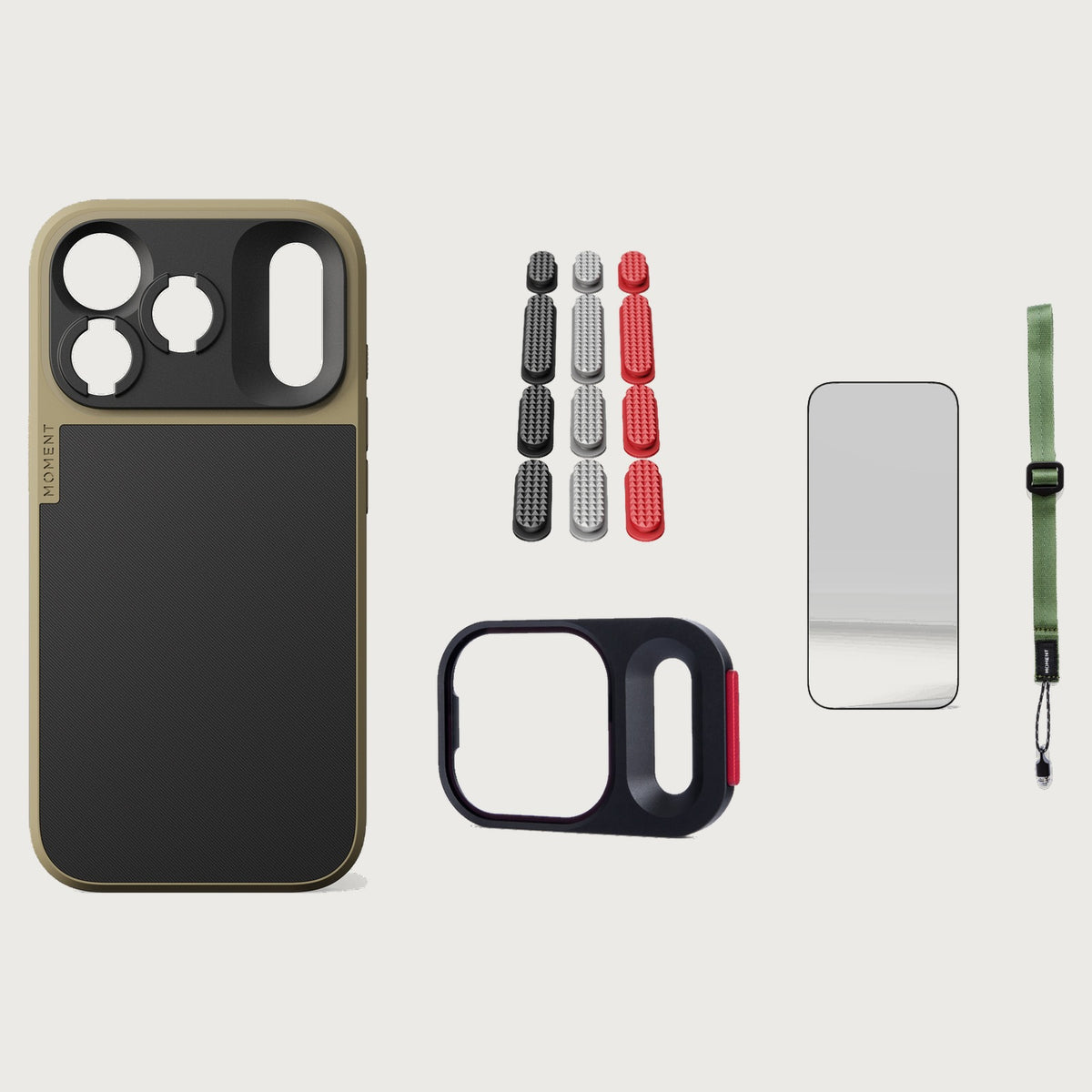 iphone-18-pro-max-case-essentials — Desert case, Metal Grip Pack (Black/Silver/Red), Olive wrist strap (AR glass + CineClear UV; no drop-in / no cleaning kit)