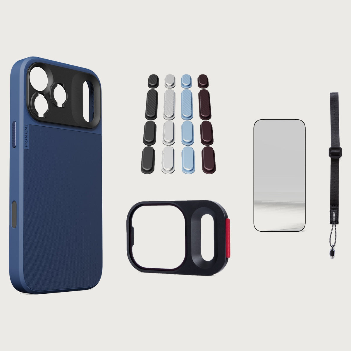 iphone-17-pro-max-case-essentials — Indigo case, Apple 2026 Pack, Desert wrist strap