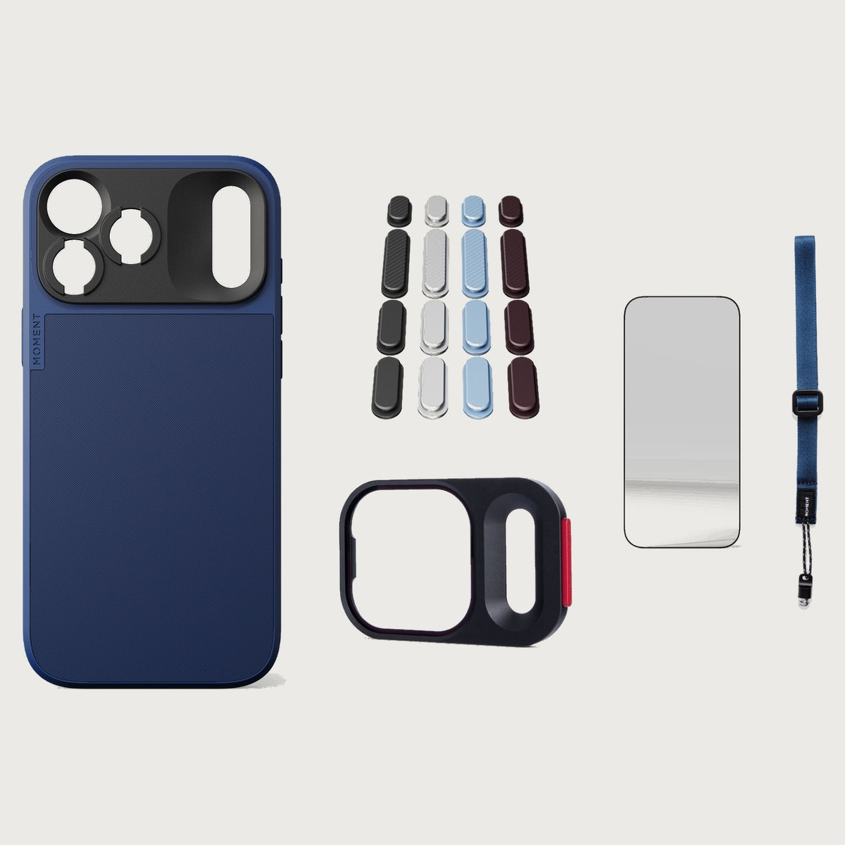 iphone-18-pro-max-case-essentials — Indigo case, Apple 2026 Pack (Black/Silver/Blue/Purple), Indigo wrist strap (AR glass + CineClear UV; no drop-in / no cleaning kit)